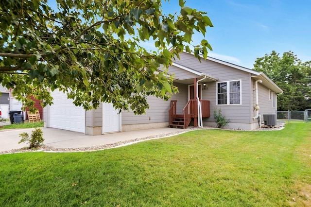 view of front of property with a front yard and central air condition unit