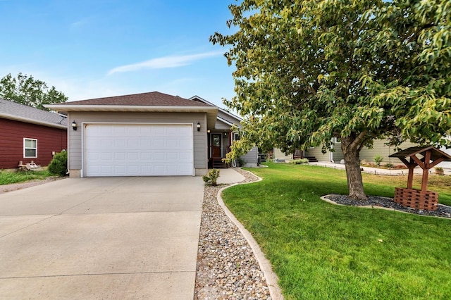 view of front of house featuring a garage and a front lawn