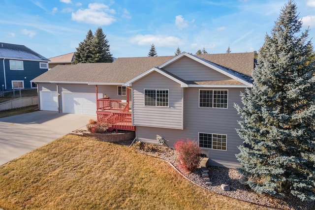 view of front of home with a wooden deck and a front yard