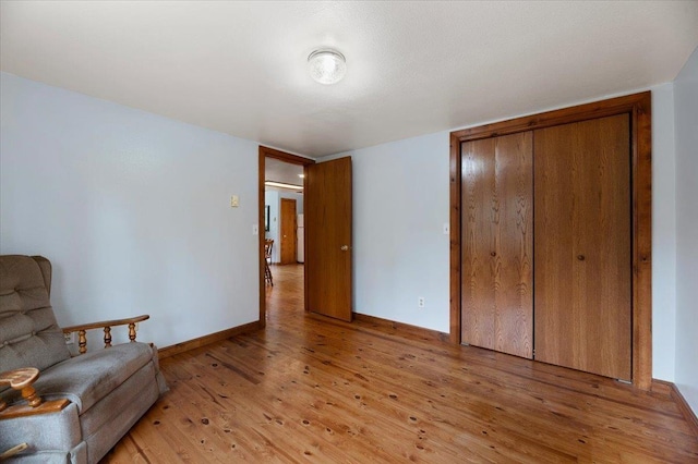 unfurnished room with light hardwood / wood-style floors