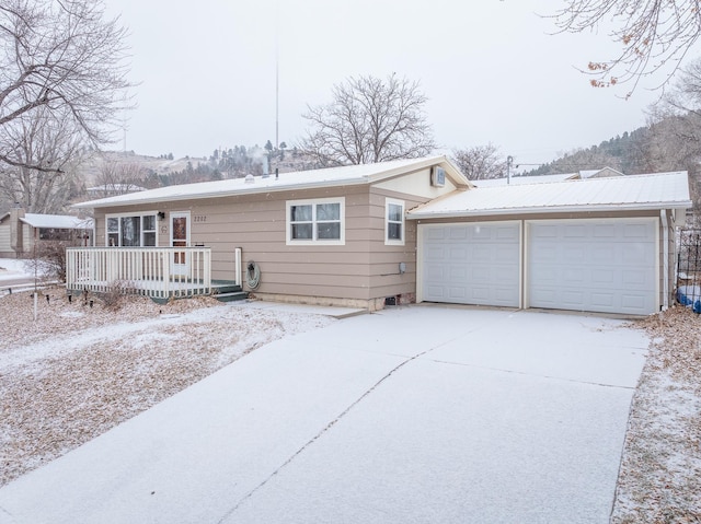 single story home featuring a garage