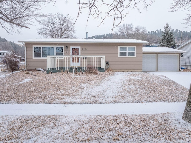 single story home with a garage