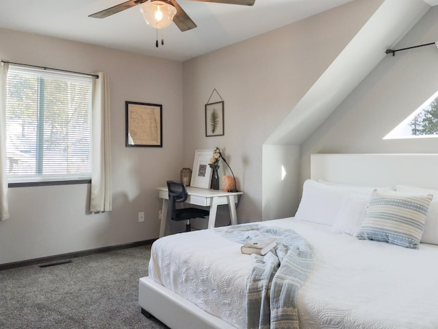 bedroom featuring ceiling fan and carpet