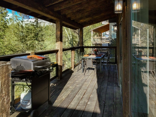 wooden deck with grilling area