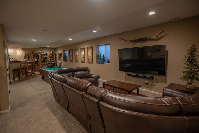 cinema with light carpet and pool table