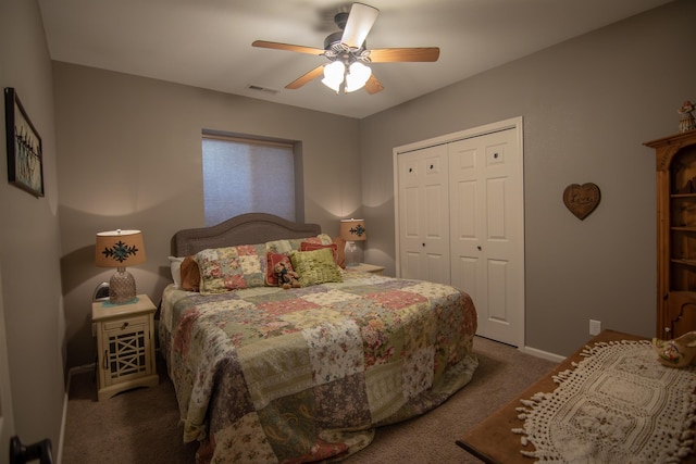 carpeted bedroom featuring ceiling fan and a closet