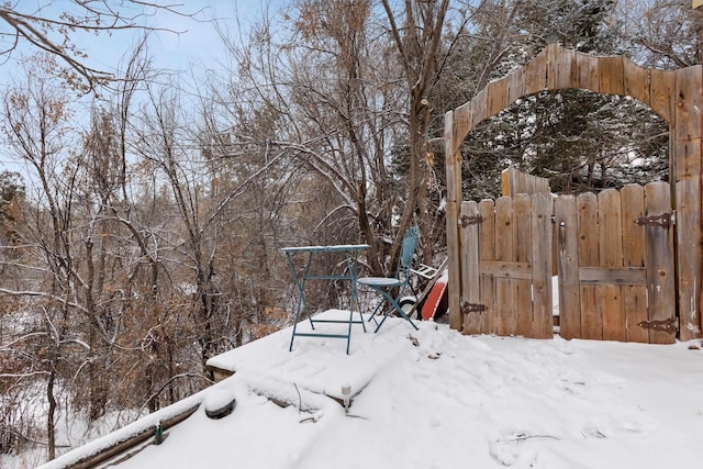 view of yard layered in snow