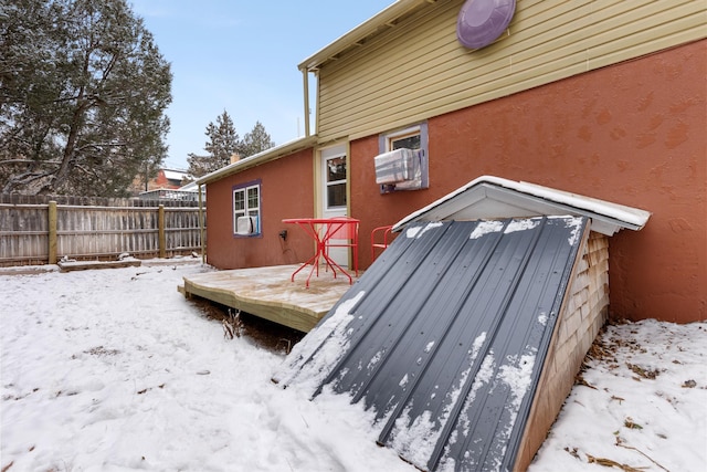 view of snow covered deck