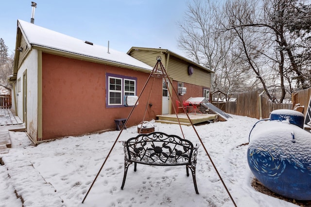 view of snow covered house