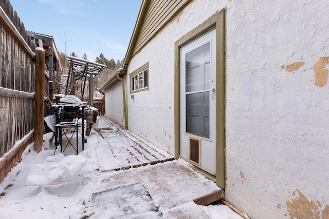 view of snow covered patio