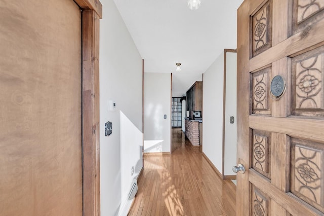 hallway featuring light hardwood / wood-style floors