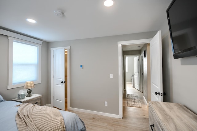 bedroom featuring light wood-type flooring