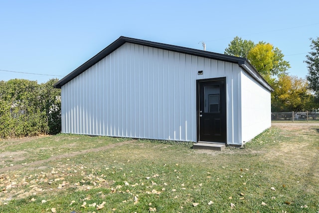 view of outdoor structure with a yard