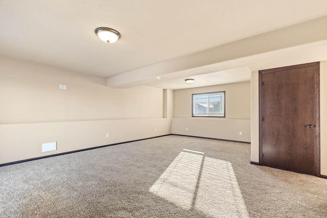 empty room with light colored carpet