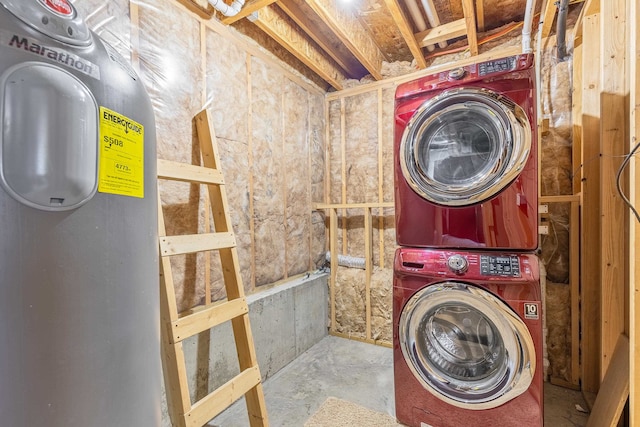 clothes washing area featuring stacked washer / drying machine