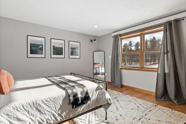 bedroom featuring hardwood / wood-style floors