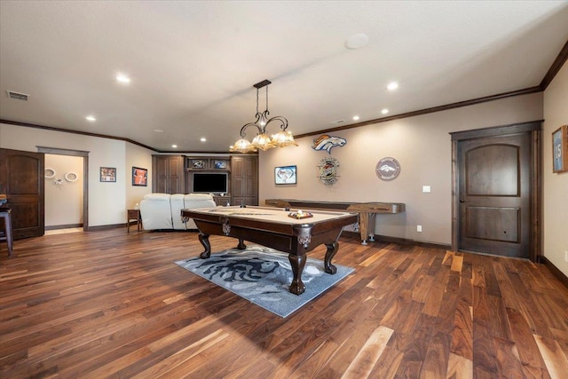 game room featuring crown molding, dark wood-type flooring, and pool table