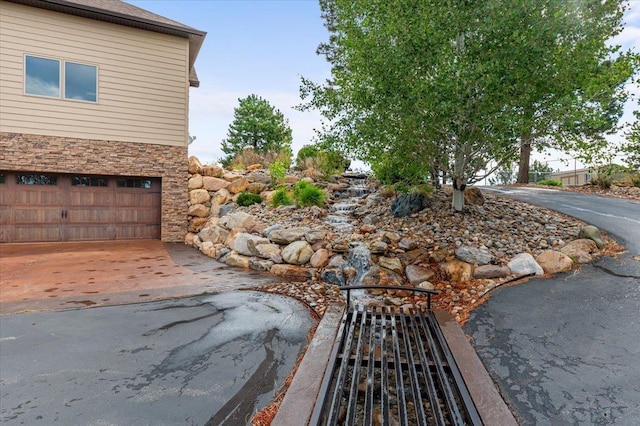 exterior space with a garage