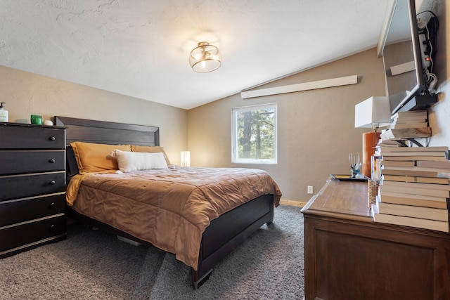 carpeted bedroom with lofted ceiling