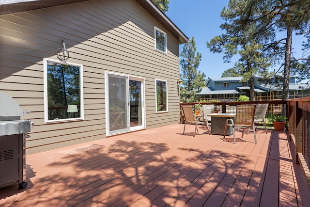 wooden deck featuring grilling area