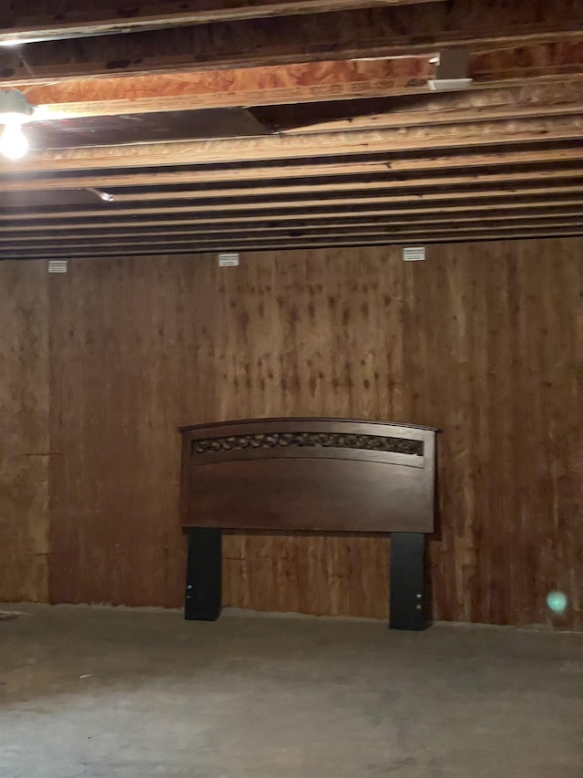 basement with wooden walls