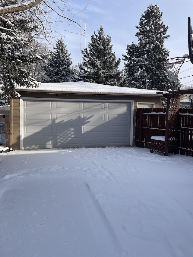 view of snow covered garage