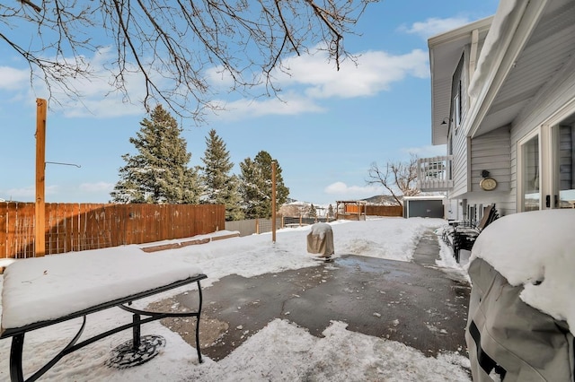 view of yard covered in snow