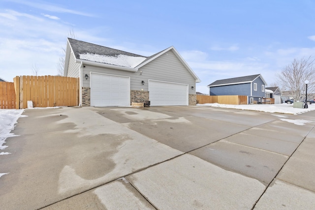 view of property exterior featuring a garage