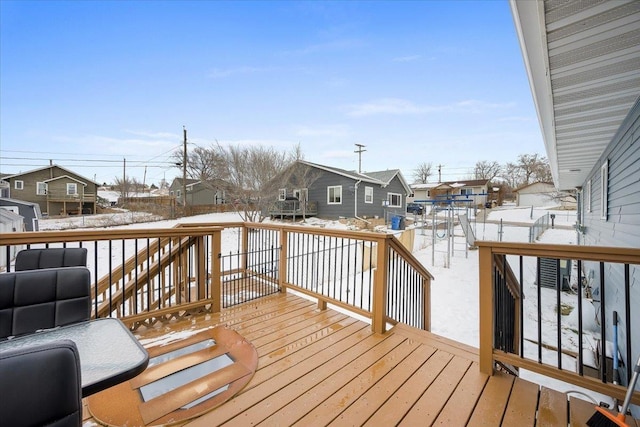 view of snow covered deck