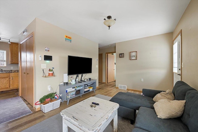 living room with light wood-type flooring