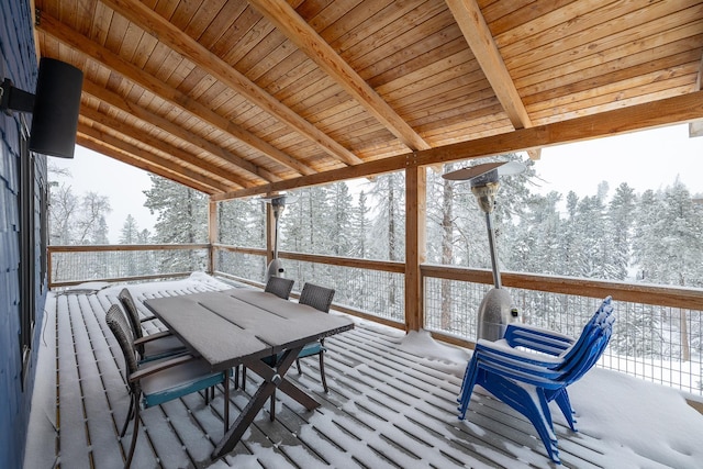 view of snow covered deck