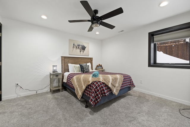 carpeted bedroom featuring ceiling fan