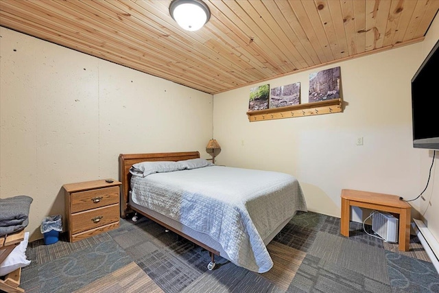 bedroom with baseboard heating, ornamental molding, and wooden ceiling