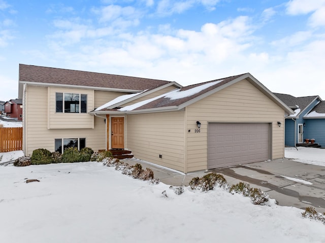 view of front of home with a garage