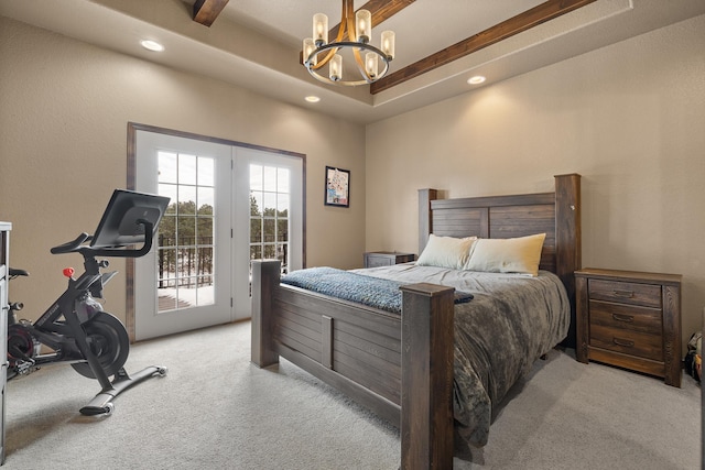 bedroom featuring access to exterior, beamed ceiling, light carpet, a raised ceiling, and a chandelier