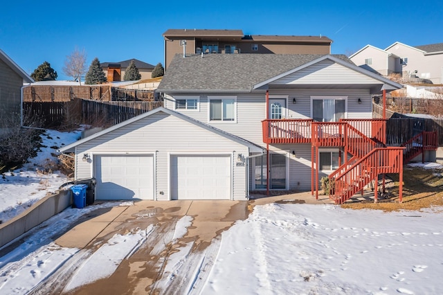 exterior space featuring a deck and a garage