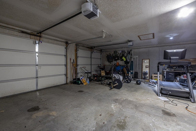 garage featuring a garage door opener