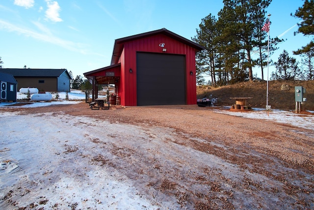 view of snow covered garage