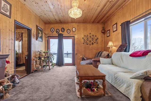 living room featuring a chandelier, a wealth of natural light, and wood ceiling