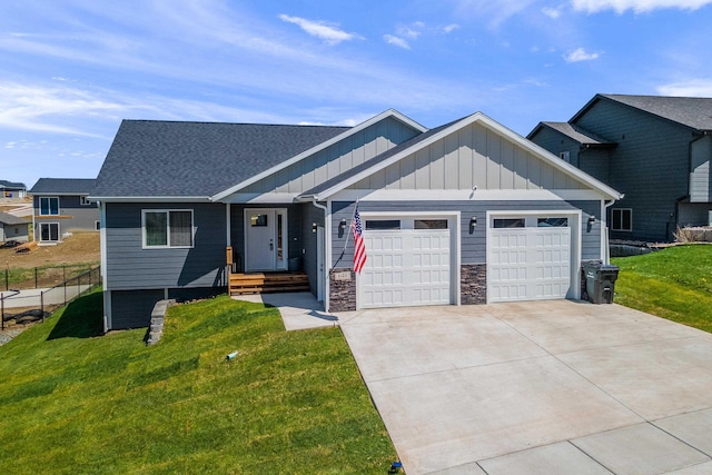 view of front facade with a front lawn and a garage