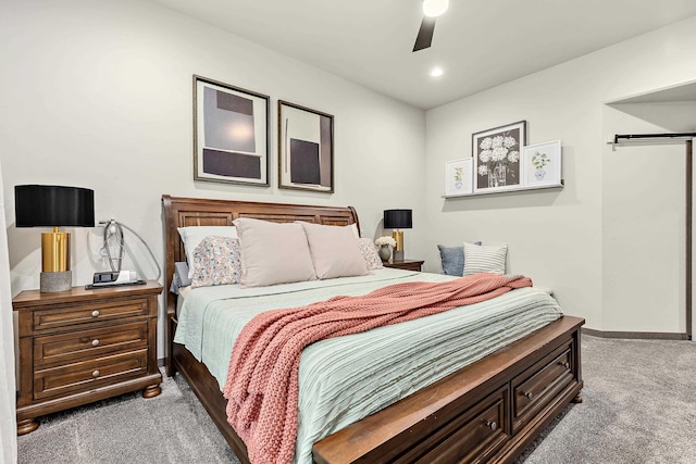 carpeted bedroom featuring ceiling fan