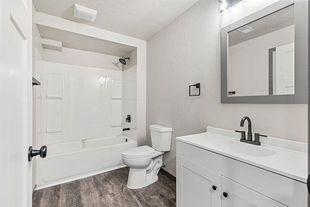 full bathroom featuring toilet, vanity, shower / bathtub combination, and hardwood / wood-style flooring