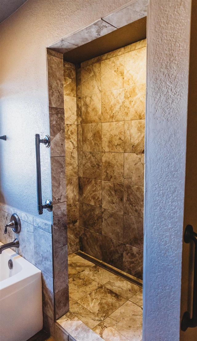 bathroom featuring shower with separate bathtub