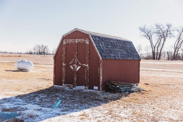 view of outbuilding featuring a rural view