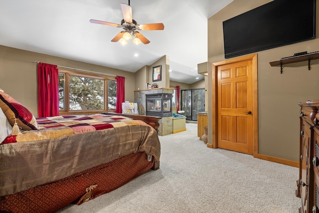 carpeted bedroom with vaulted ceiling and a multi sided fireplace