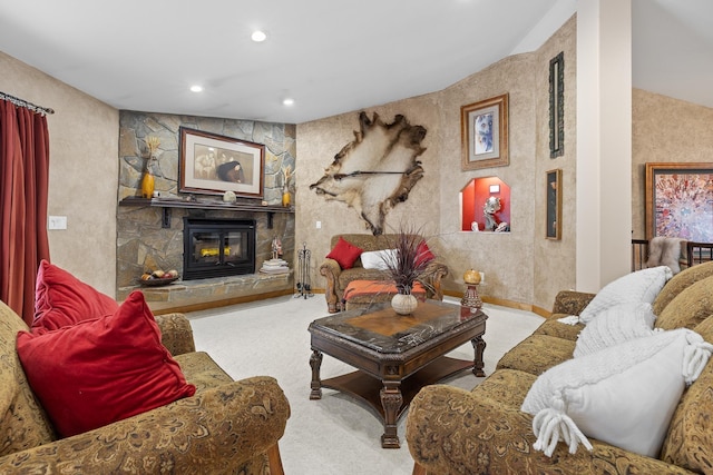 living room featuring a stone fireplace and light colored carpet