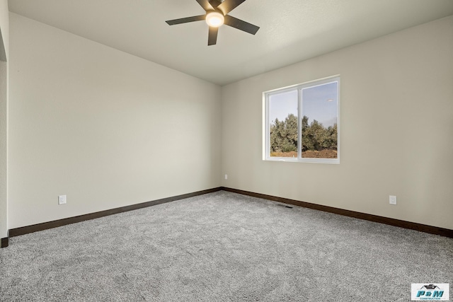 unfurnished room featuring carpet floors and ceiling fan