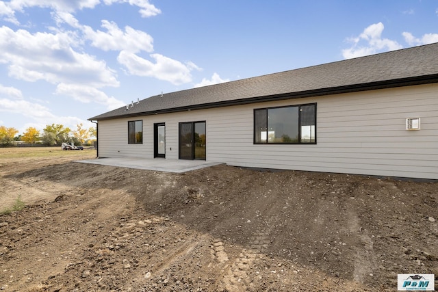 rear view of house with a patio area