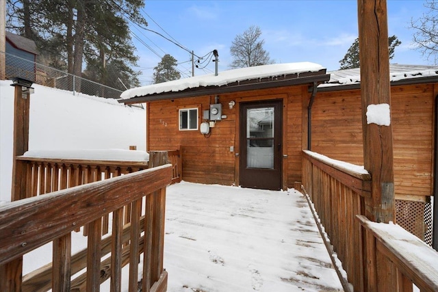 view of snow covered deck