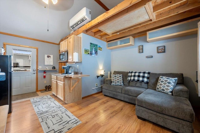 living room featuring crown molding, ceiling fan, a wall mounted AC, and light wood-type flooring